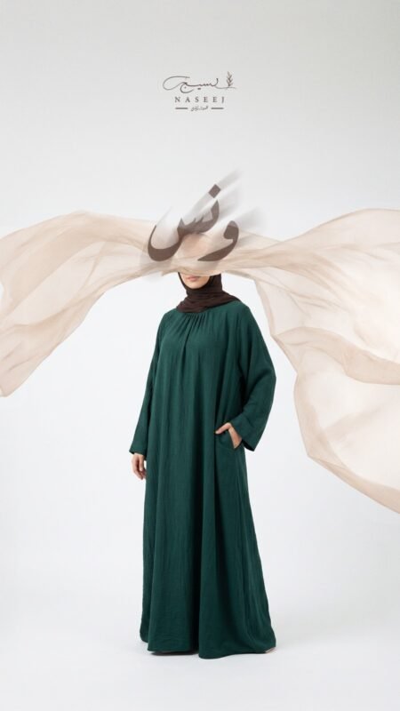 Wons modest linen dress with practical pockets by NASEEJ